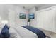 Bedroom with neutral tones, closet, comfortable bedding and wall art at 13606 Summer Rain Dr, Orlando, FL 32828
