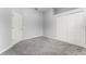 Neutral bedroom featuring closet space, ample light and grey carpet at 13606 Summer Rain Dr, Orlando, FL 32828