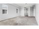 Massive main bedroom features carpet flooring, three windows, neutral walls, and an ensuite bath at 13606 Summer Rain Dr, Orlando, FL 32828