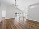 Spacious open living space with vaulted ceilings and wood flooring at 150 Bentley Oaks Blvd, Davenport, FL 33896
