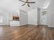 Inviting living space with cathedral ceiling that connects to dining and kitchen area at 150 Bentley Oaks Blvd, Davenport, FL 33896