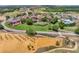 Stunning aerial view of a luxurious estate, showcasing the expansive grounds and unique architecture at 16808 Bolsena Dr, Bella Collina, FL 34756
