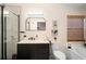 Stylish bathroom with modern vanity, marble shower, and sleek fixtures at 1848 Jimson Ave, Ocoee, FL 34761