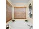 Large bathtub with bamboo blinds providing lots of natural light at 1848 Jimson Ave, Ocoee, FL 34761