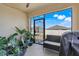 Enclosed patio featuring neutral colors, a bench, and plants at 210 Hydra Way, Groveland, FL 34736