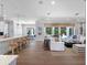 Open-concept living space with kitchen, dining, and living areas at 2171 Forrest Rd, Winter Park, FL 32789