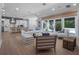 Bright and airy living space with views of the pool and backyard at 2171 Forrest Rd, Winter Park, FL 32789