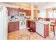 Functional kitchen with tile flooring, a microwave, and ample countertop space at 225 Loma Del Sol Dr, Davenport, FL 33896
