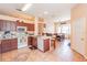 Cozy kitchen features tile flooring, appliances, and ample cabinet space at 225 Loma Del Sol Dr, Davenport, FL 33896