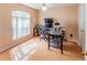 Well-lit office with hardwood floors, a desk, and plenty of natural light at 225 Loma Del Sol Dr, Davenport, FL 33896