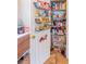Well-stocked pantry with door storage to maximize space and organization at 225 Loma Del Sol Dr, Davenport, FL 33896