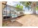 An enclosed pool area provides recreation and privacy in a backyard setting at 225 Loma Del Sol Dr, Davenport, FL 33896