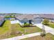 Beautiful single-story home features well-maintained landscaping, a two-car garage, and a charming front yard with a gorgeous curb appeal at 236 Aquamarine Ln, Kissimmee, FL 34758