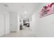 Bright hallway with tile floors leading to the living area of the home at 236 Aquamarine Ln, Kissimmee, FL 34758