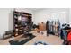 Office space with built-in shelving, desk, and room for storage with boxes at 236 Aquamarine Ln, Kissimmee, FL 34758