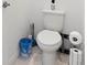 A commode features an elevated tank with toiletries and toilet paper at 236 Aquamarine Ln, Kissimmee, FL 34758