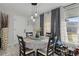 Bright dining room with modern lighting, table for four, and large decorative vase at 24 W King St, Orlando, FL 32804