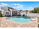 Backyard pool and spa area featuring a patio, grill, and basketball court at 2424 Antlia Dr, Orlando, FL 32828