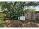 Wonderful backyard featuring a mature shade tree with hanging swing at 2623 Parsley Dr, Orlando, FL 32837