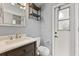 This bathroom includes a marble vanity and wooden accents at 2623 Parsley Dr, Orlando, FL 32837