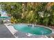 Enjoy this private backyard pool surrounded by lush landscaping perfect for relaxation and outdoor entertaining at 2623 Parsley Dr, Orlando, FL 32837