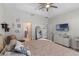 Cozy bedroom with neutral tones, stylish decor, and ample space to unwind and relax at 2651 Sunrise Blvd, Mount Dora, FL 32757