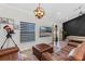 Bright and airy living area featuring modern decor, comfortable seating, and a sleek design at 2651 Sunrise Blvd, Mount Dora, FL 32757