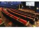 This fantastic home theater boasts comfortable seating and a large screen for the ultimate movie experience at 26712 Augusta Springs Cir, Leesburg, FL 34748