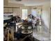 Functional kitchen adjacent to a dining area with abundant natural light at 301 Blue Bayou Dr, Kissimmee, FL 34743