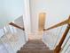 View from the staircase looking down to the home's flooring at 3020 Zaharias Dr, Orlando, FL 32837