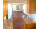 Spacious living room featuring wood floors and bright natural light at 311 E Bridgers Ave, Auburndale, FL 33823