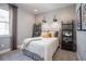 Charming bedroom with ample natural light, contemporary decor, and plush carpeting at 3289 Songbird Cir, Harmony, FL 34773