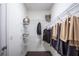Organized walk-in closet with metal shelving and ample storage space at 3289 Songbird Cir, Harmony, FL 34773
