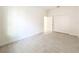 A modern, empty bedroom with tiled floors and a double door closet at 341 Bahia Cir, Longwood, FL 32750