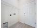 Laundry room with tile flooring, wire shelving and a utility sink hookup at 341 Bahia Cir, Longwood, FL 32750