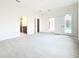 Open-concept space with multiple doorways and tile flooring at 341 Bahia Cir, Longwood, FL 32750