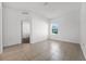 Neutral bedroom featuring tile floors, a window, and closet at 3753 Apopka Ridge Cir, Apopka, FL 32703