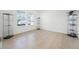 Bright bonus room with tile floors features ample natural light and display cases for collectibles at 3753 Apopka Ridge Cir, Apopka, FL 32703