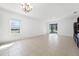 Open concept living area featuring tile floors, neutral paint and natural light at 3753 Apopka Ridge Cir, Apopka, FL 32703