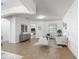 Spacious living room with neutral color palette, tiled floor, and arched doorway at 3908 Coastal Breeze Dr, Kissimmee, FL 34744