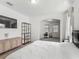 Main bedroom showcasing a large window, media center and access to office space at 3908 Coastal Breeze Dr, Kissimmee, FL 34744