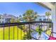 Balcony view overlooking a yard with trees and the community pool at 4117 S Semoran Blvd # 17, Orlando, FL 32822