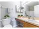 Bathroom featuring a sink and vanity with framed mirror and plants at 4117 S Semoran Blvd # 17, Orlando, FL 32822