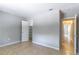 Bedroom view showcasing a walk-in closet and hall access at 4117 S Semoran Blvd # 17, Orlando, FL 32822