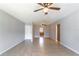 Open living room with tile floors connecting to a view of the kitchen at 4117 S Semoran Blvd # 17, Orlando, FL 32822