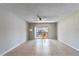 Bright, open living room with tiled flooring and sliding glass doors to a patio at 4117 S Semoran Blvd # 17, Orlando, FL 32822