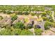 Scenic aerial shot of the apartment buildings surrounded by lush greenery, highlighting community's peaceful setting at 420 Summit Ridge Pl # 112, Longwood, FL 32779