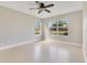 Bright bedroom featuring neutral walls, a ceiling fan, and two windows that provide ample natural light at 420 Summit Ridge Pl # 112, Longwood, FL 32779