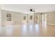 Bright, airy living room with large windows and neutral tile floors bathed in natural light at 420 Summit Ridge Pl # 112, Longwood, FL 32779