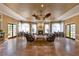 Resident lounge with tile floors, fireplace, ceiling fans and leather couches at 420 Summit Ridge Pl # 112, Longwood, FL 32779